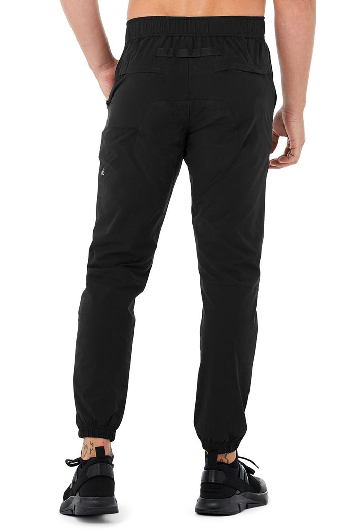 Black Alo Yoga Talus Tech Men's Pants | 85761AKUT