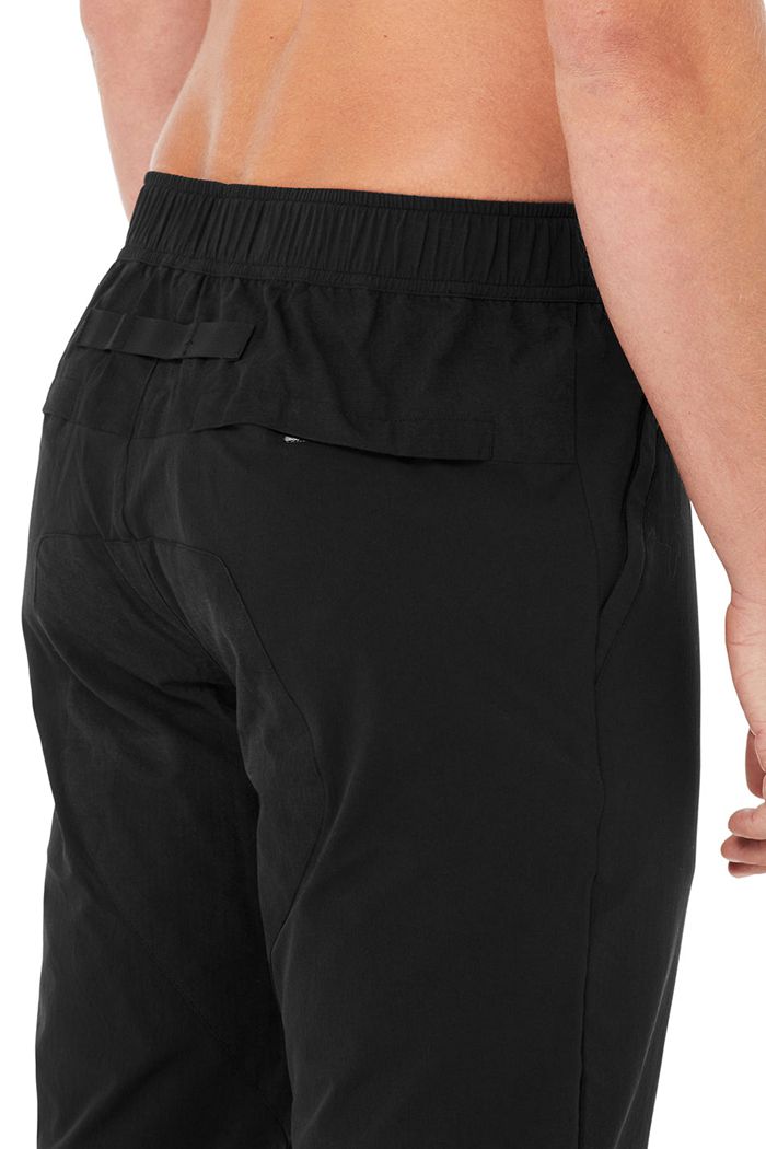 Black Alo Yoga Talus Tech Men's Pants | 85761AKUT